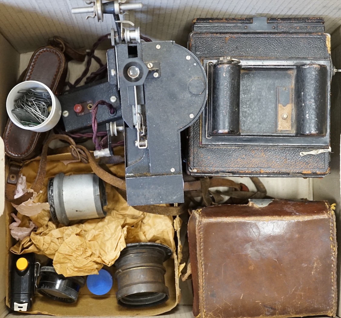 An Ensign Popular large format reflex camera, two cine cameras, projector, lenses etc.